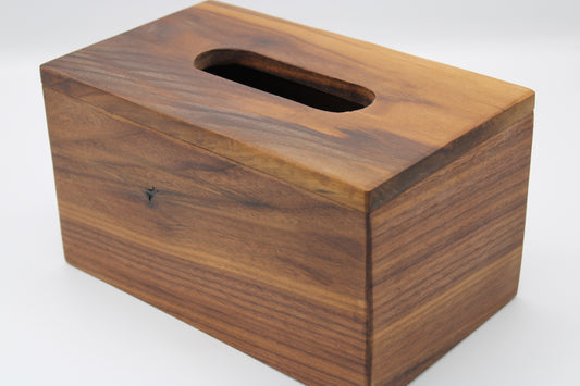 Wooden tissue box cover on a white background