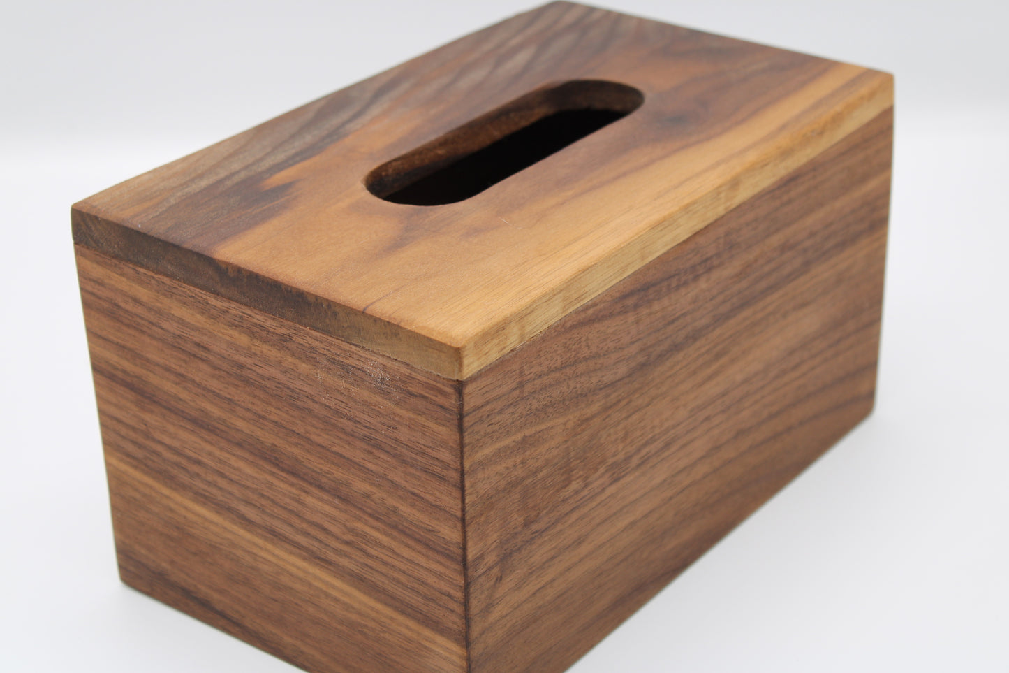 Wooden tissue box cover on a white background