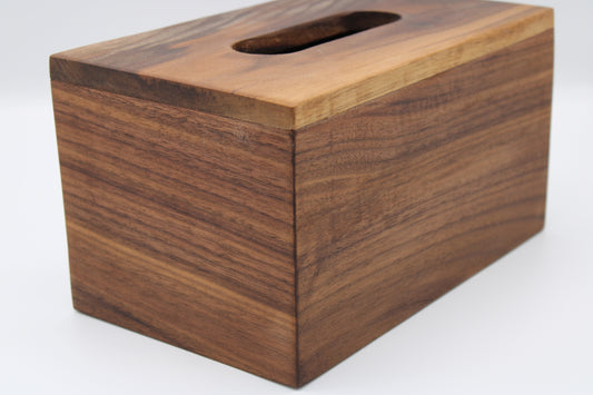 Wooden tissue box cover on a white background