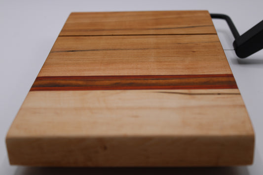Wooden cheese cutting board with slicer on a white background