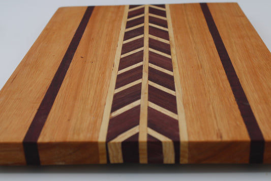 Wood cutting board chevron design and stripes