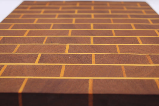 Wooden cutting in running bond pattern in medium brown and orange