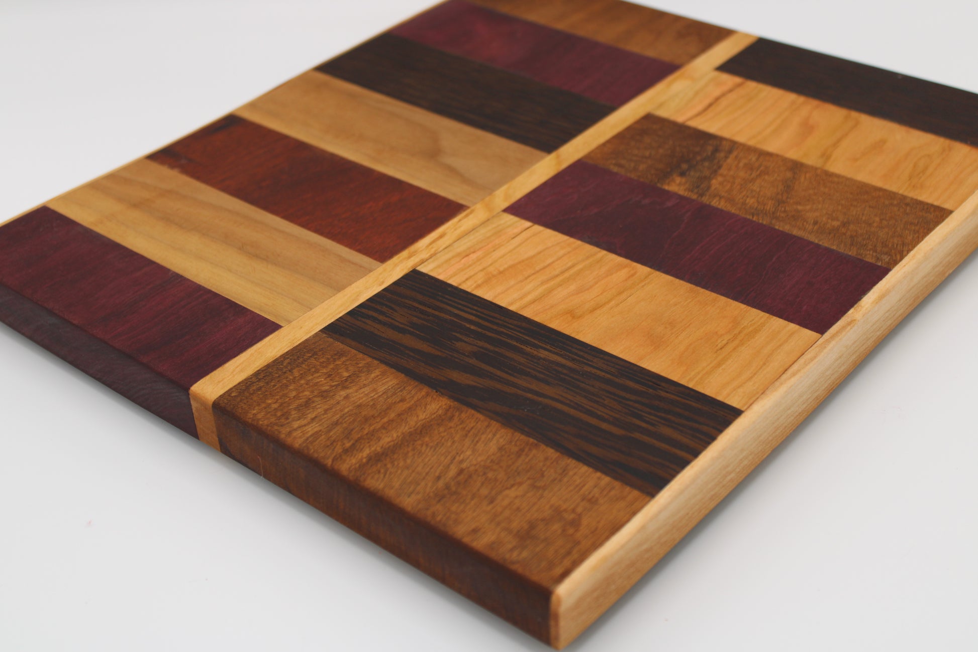 Design #030 wood used Cherry, Padauk Zebrawood, Walnut, Purpleheart and Wenge 13.5x12x1