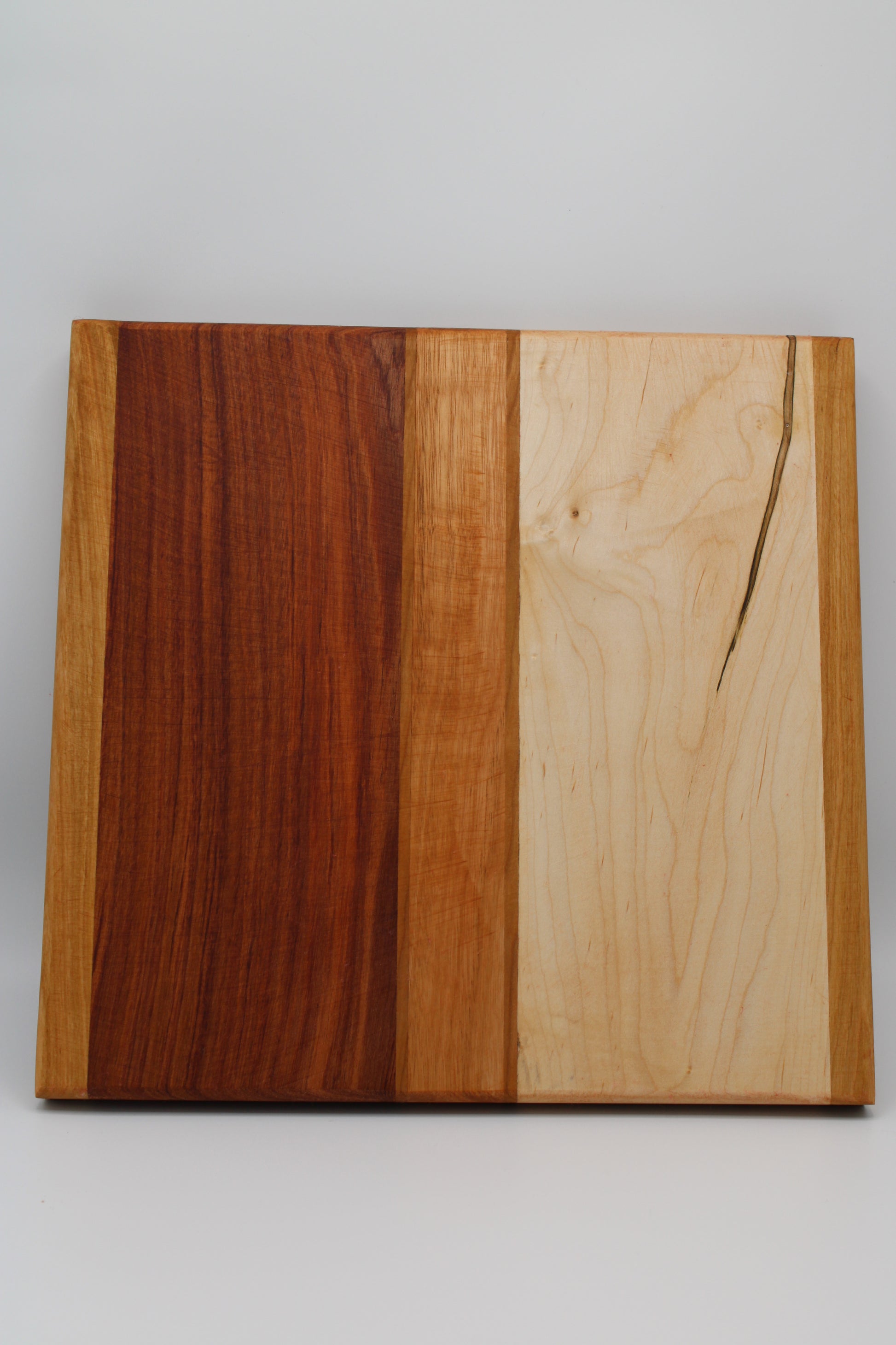 Design #026 wood used Cherry, Bubinga, Canarywood and Wormy Red Maple 12.5x12.5x1