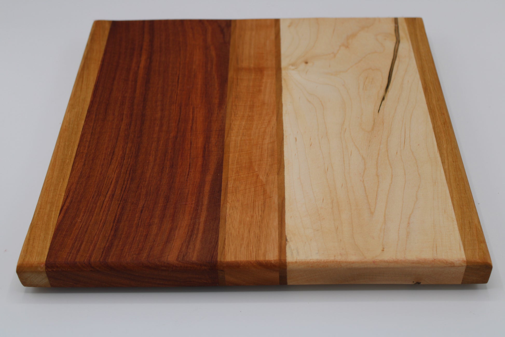 Design #026 wood used Cherry, Bubinga, Canarywood and Wormy Red Maple 12.5x12.5x1