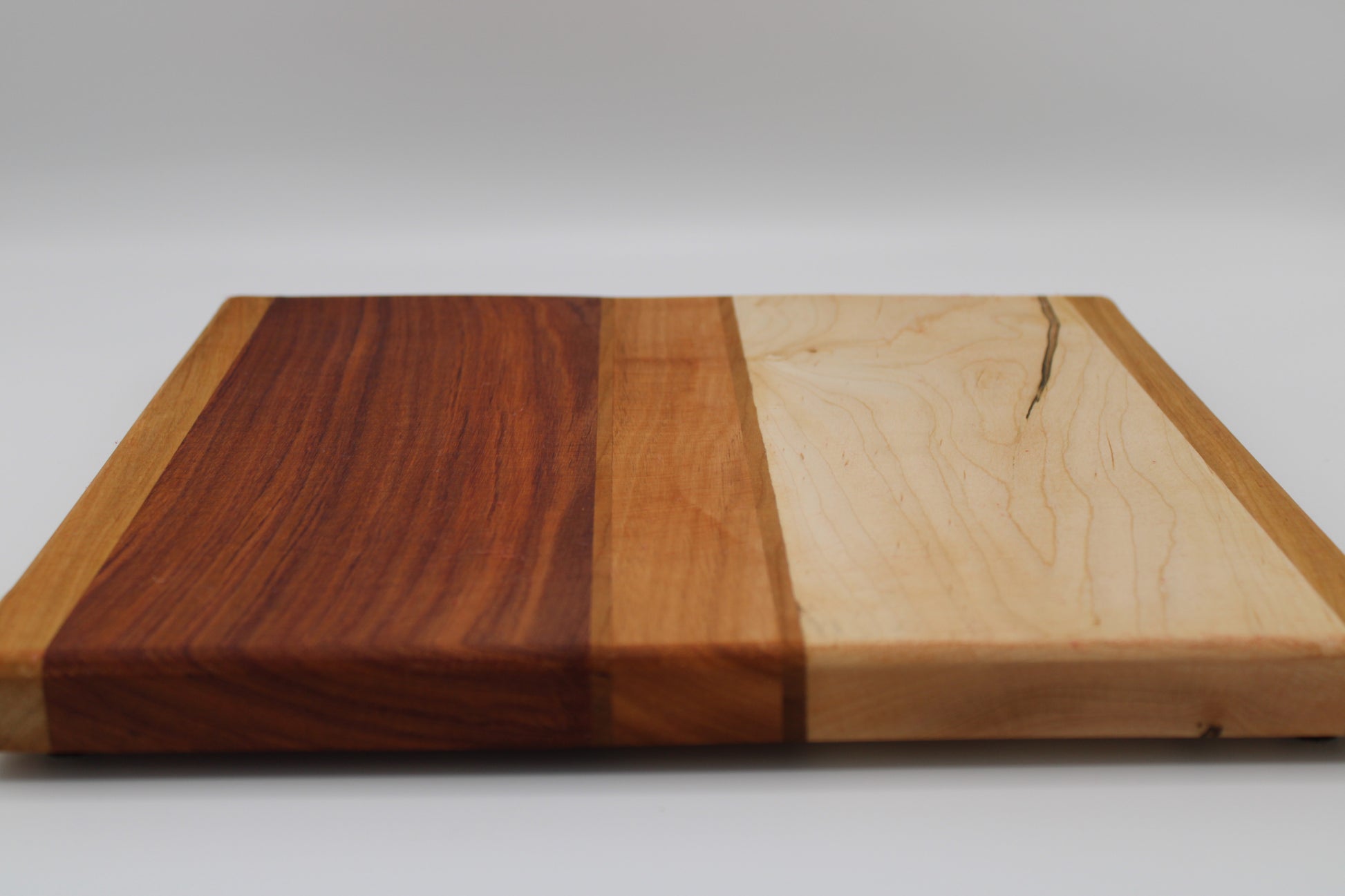 Design #026 wood used Cherry, Bubinga, Canarywood and Wormy Red Maple 12.5x12.5x1