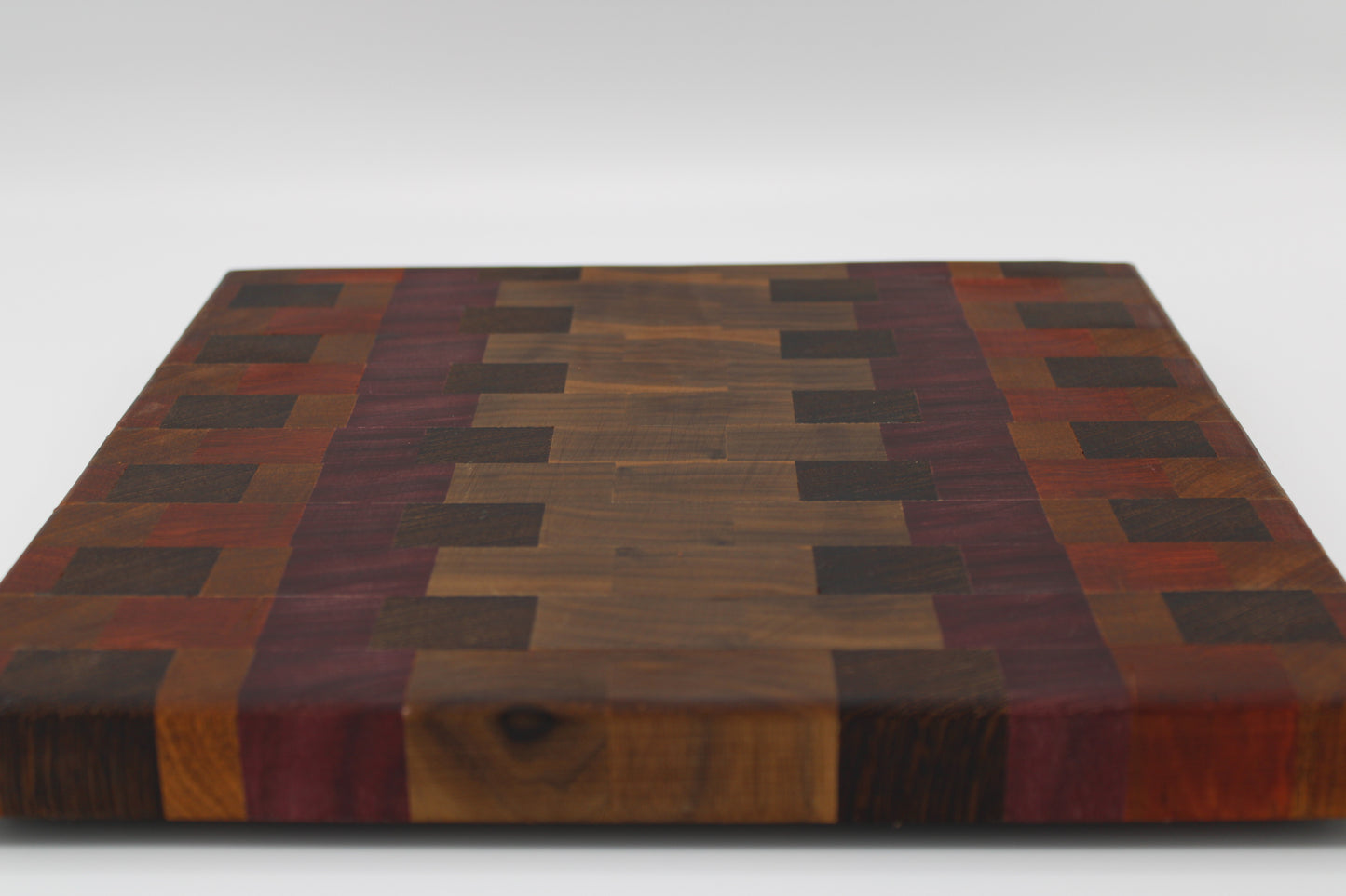 Design #028 wood used Purpleheart, Walnut, Bloodwood and Wenge 10.75x11.25x1