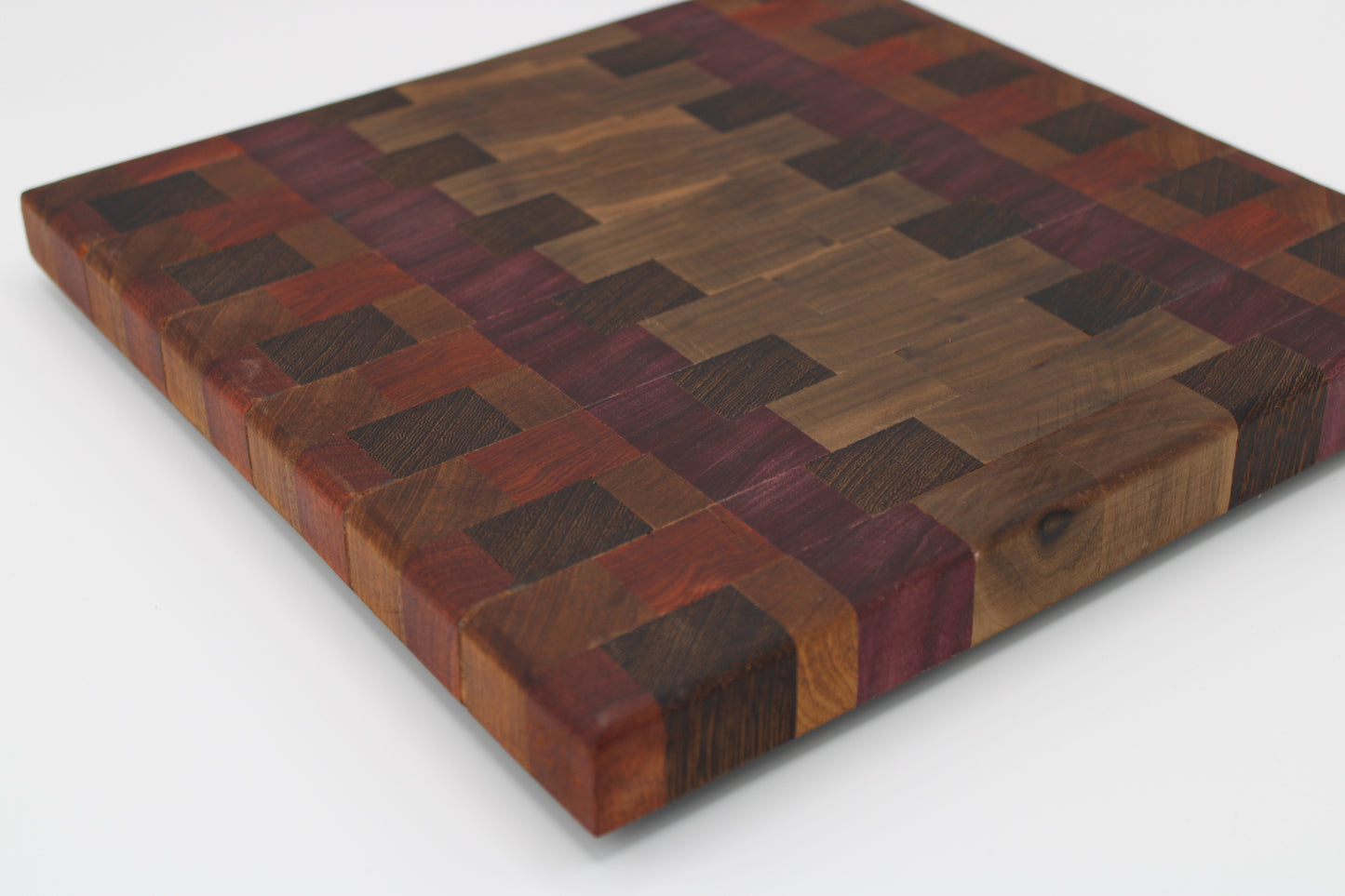 Design #028 wood used Purpleheart, Walnut, Bloodwood and Wenge 10.75x11.25x1