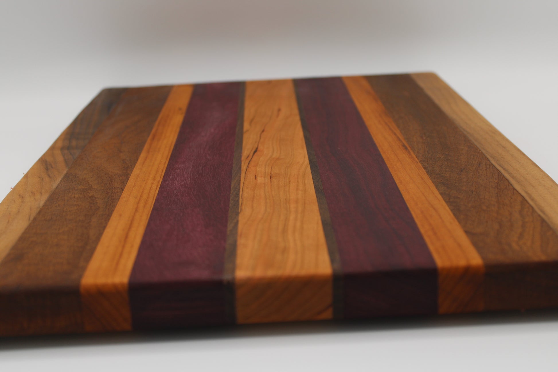 Design #020 wood used Cherry, Leopardwood, Purpleheart and Walnut 15.75x11.5x1