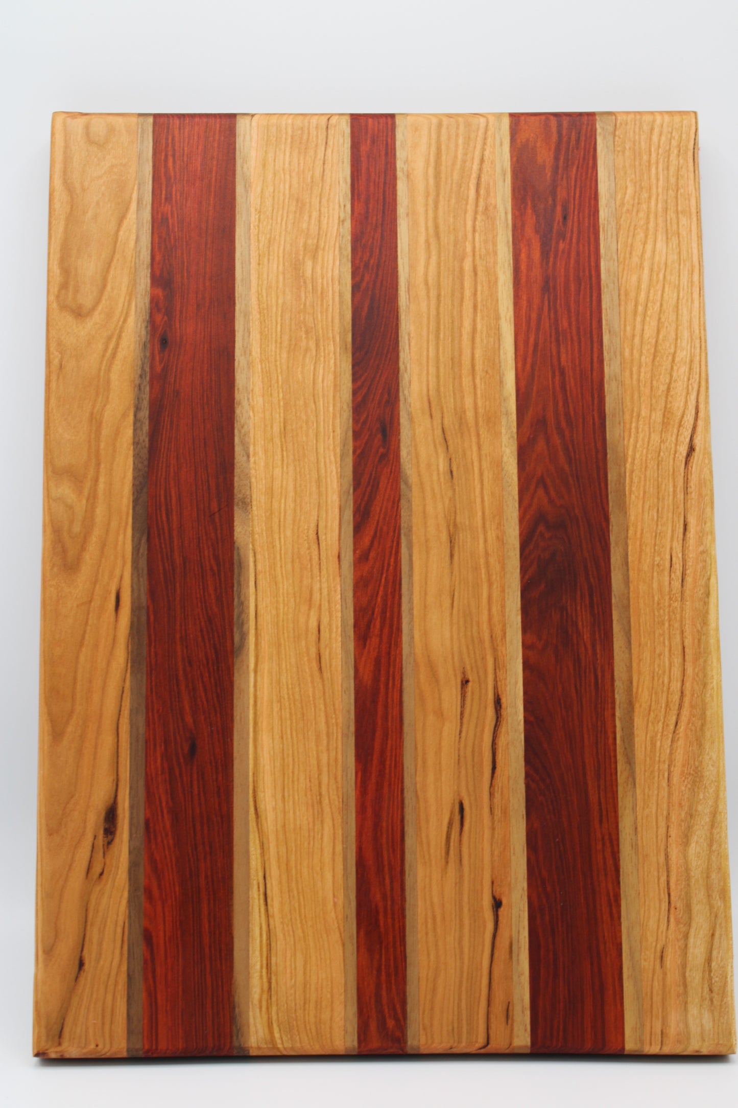 Design #021 wood used Tigerwood, Walnut and Sapele 15.75x11.25x1