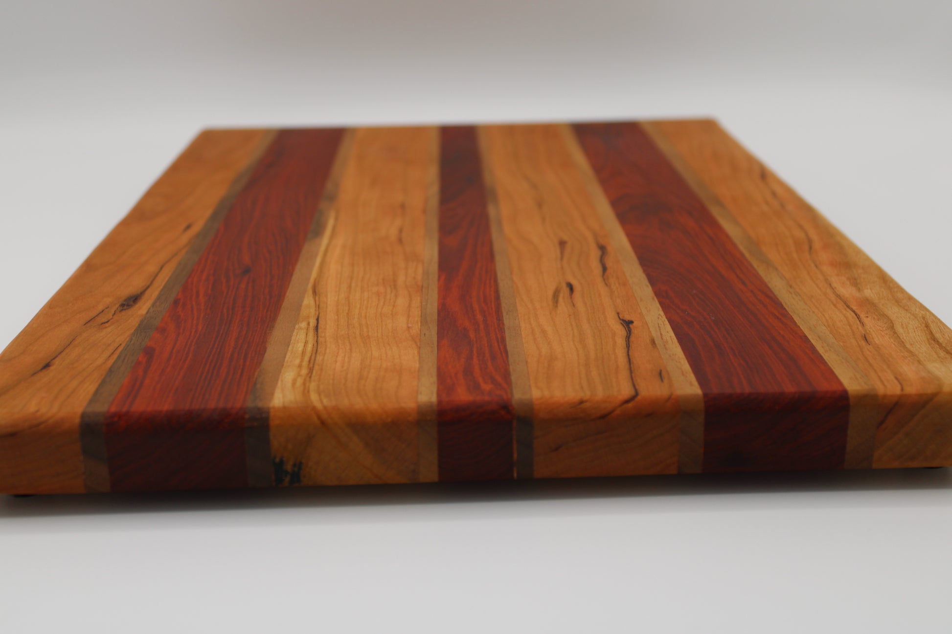 Design #021 wood used Tigerwood, Walnut and Sapele 15.75x11.25x1