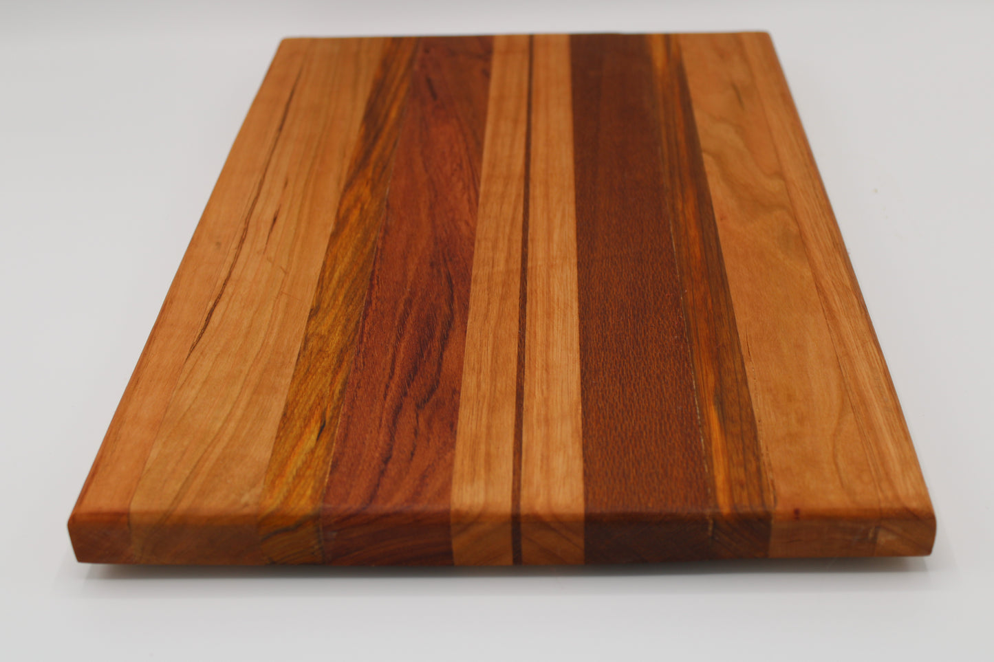 Design #014 wood used Cherry, Red Grandis, Canarywood, Leopardwood, Bubinga 14.5x10.25x1