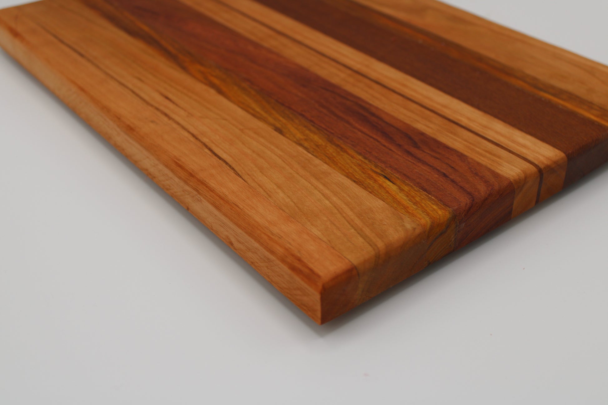 Design #014 wood used Cherry, Red Grandis, Canarywood, Leopardwood, Bubinga 14.5x10.25x1