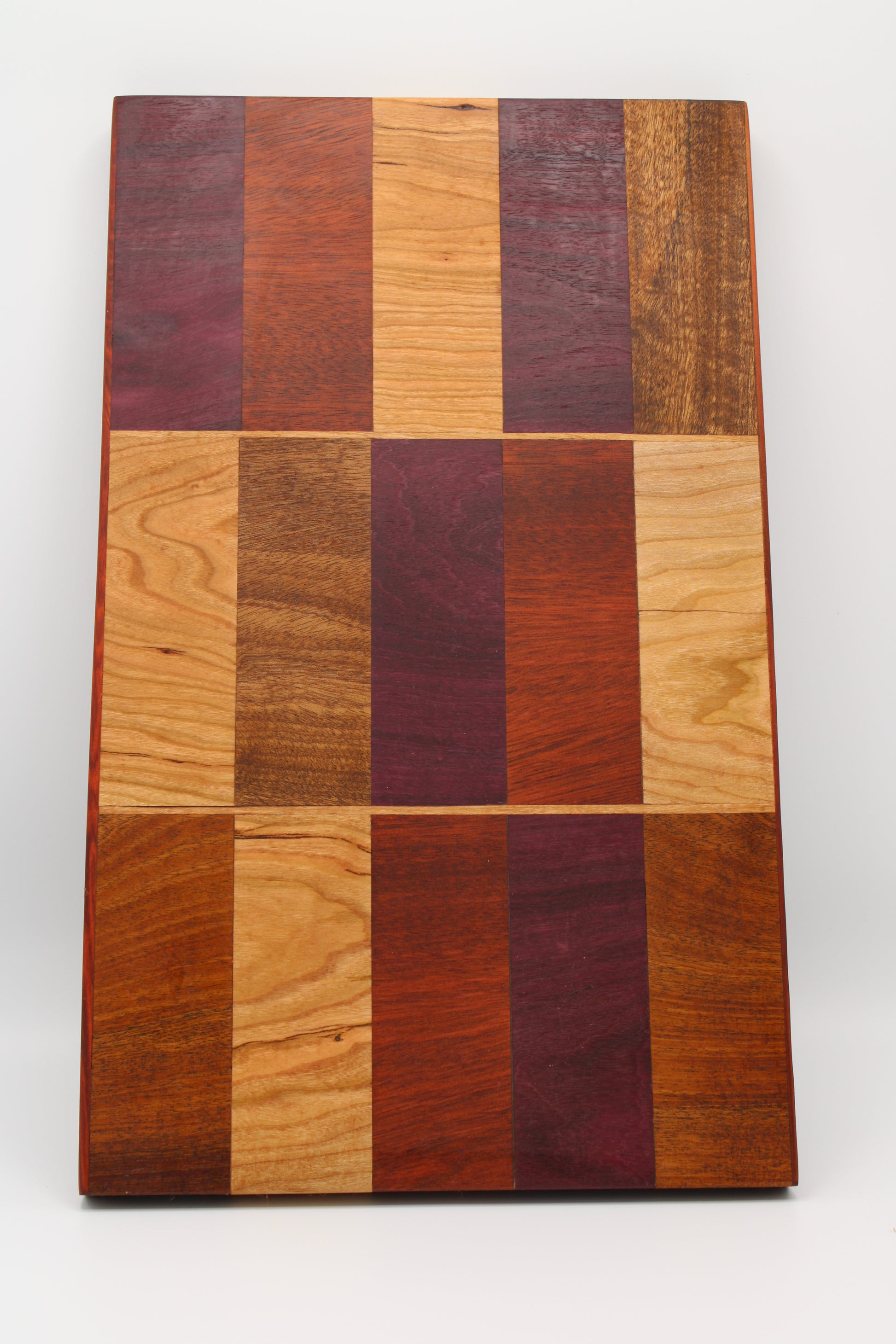 Design #032 wood used Cherry, Purpleheart, Walnut and Padauk 16.5x10x1