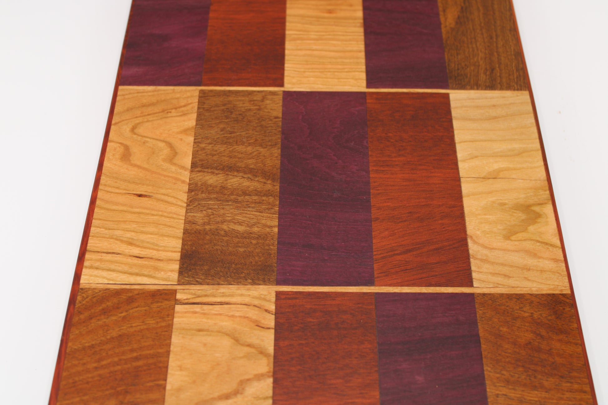 Design #032 wood used Cherry, Purpleheart, Walnut and Padauk 16.5x10x1