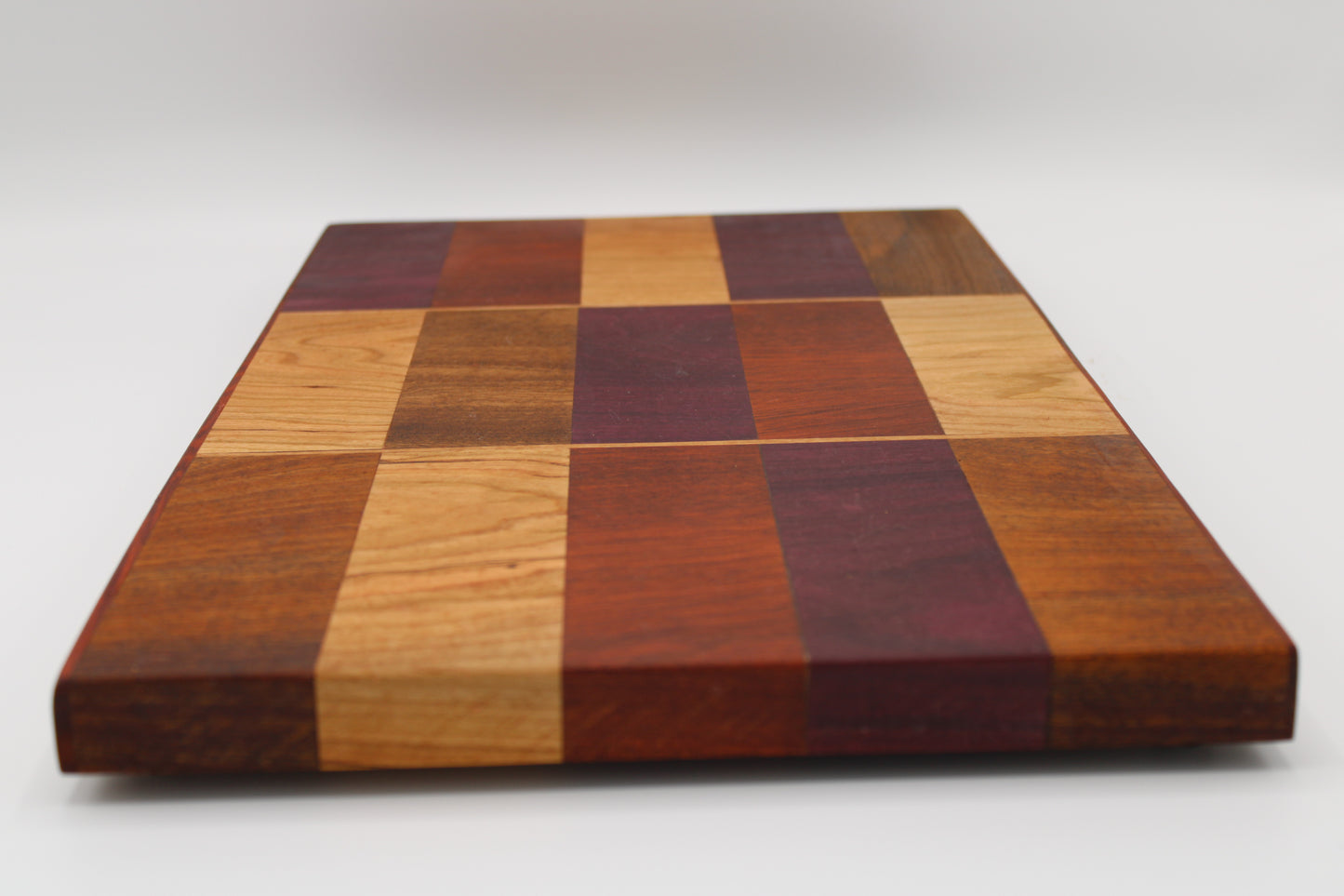 Design #032 wood used Cherry, Purpleheart, Walnut and Padauk 16.5x10x1