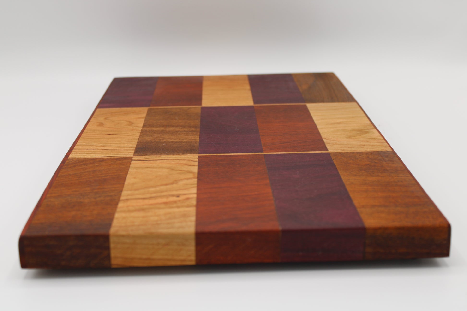 Design #032 wood used Cherry, Purpleheart, Walnut and Padauk 16.5x10x1