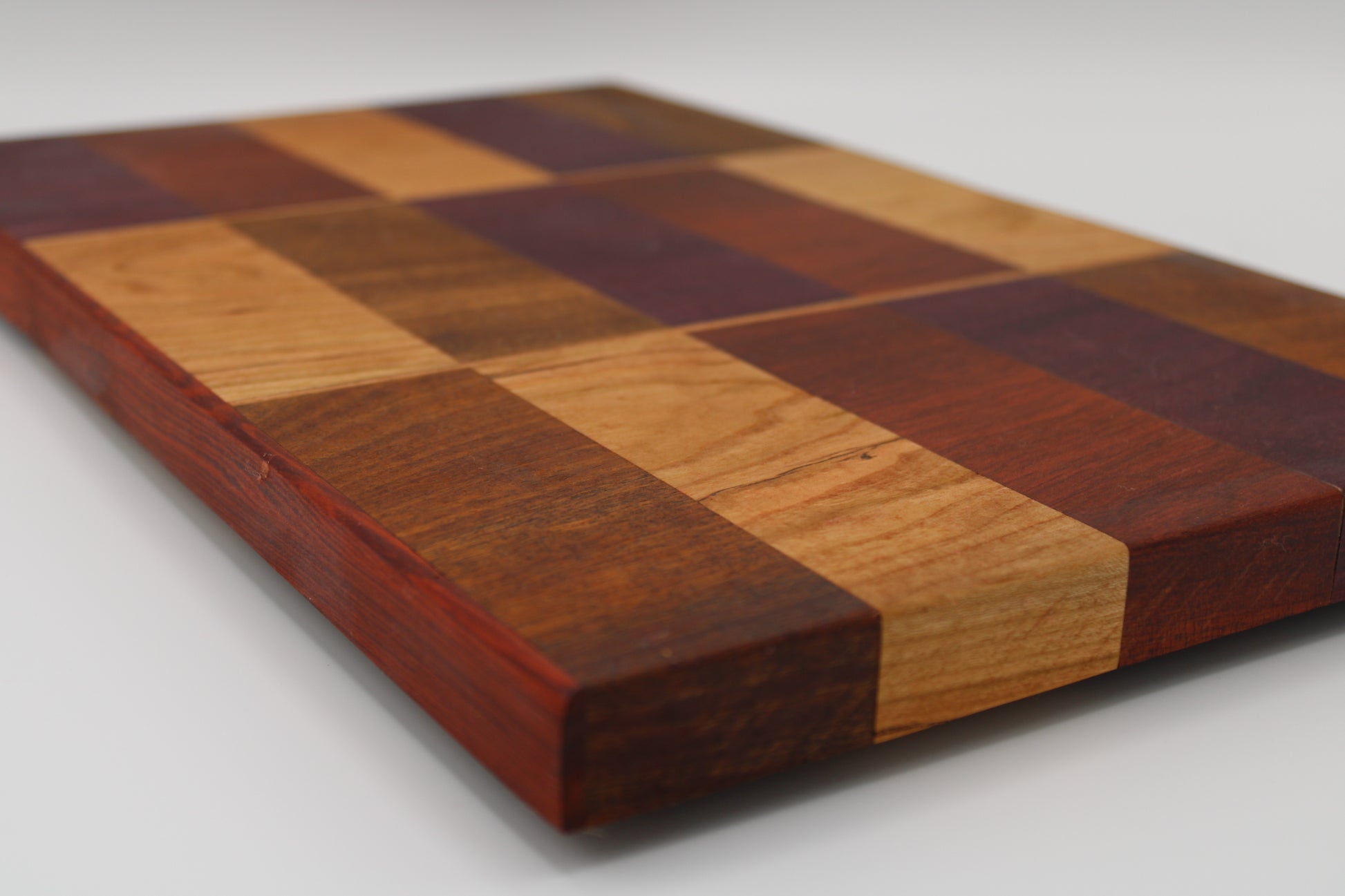 Design #032 wood used Cherry, Purpleheart, Walnut and Padauk 16.5x10x1