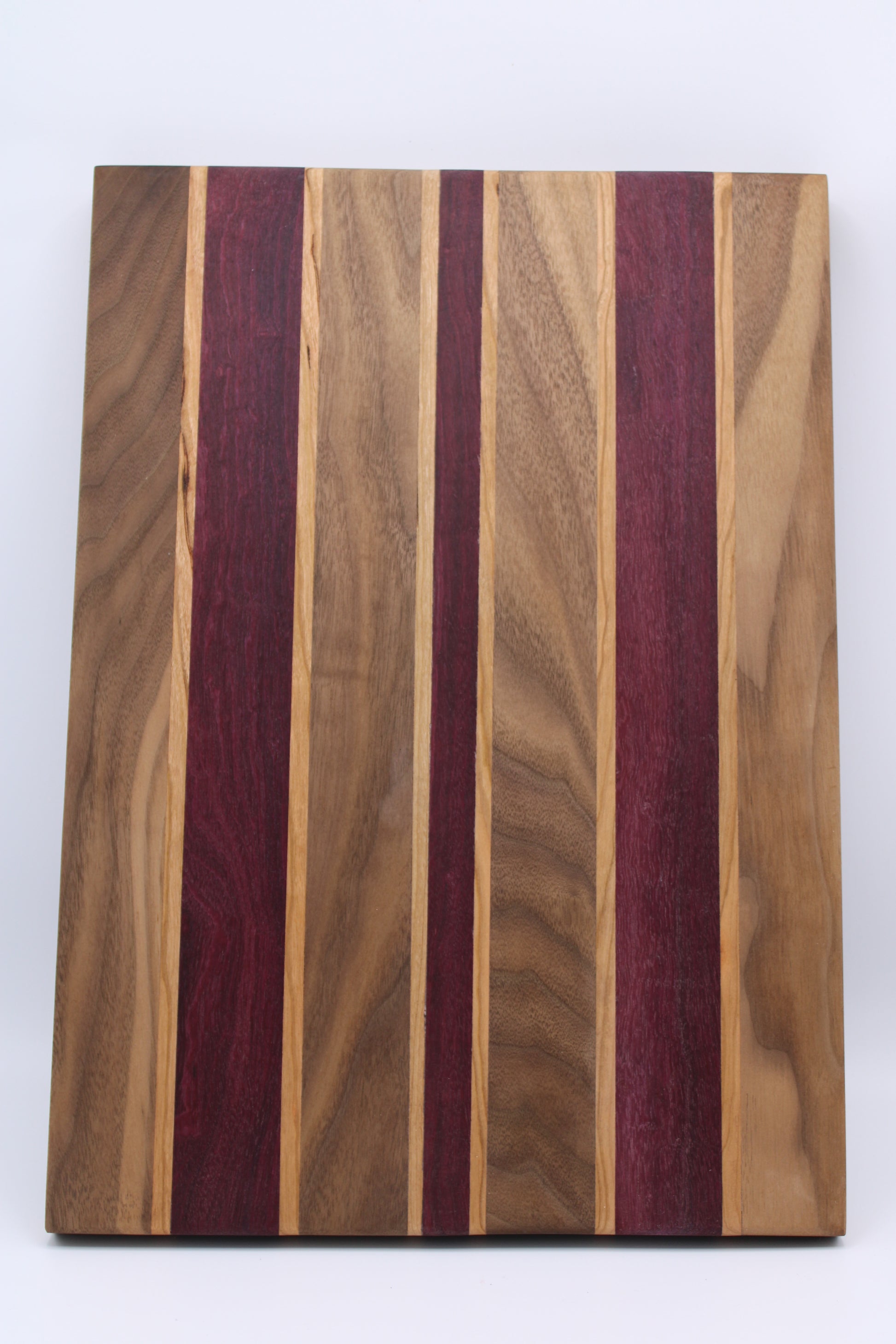 Design #019 wood used Cherry, Purpleheart and Walnut 15.75x11.25x1