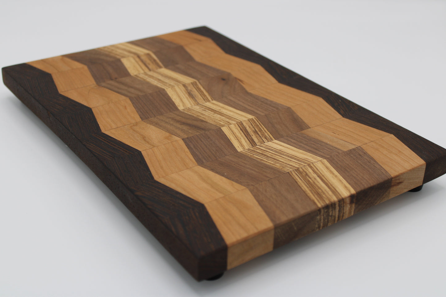 Design #012 wood used Cherry, Zebrawood, Walnut and Wenge 12.3x8.3x0.75