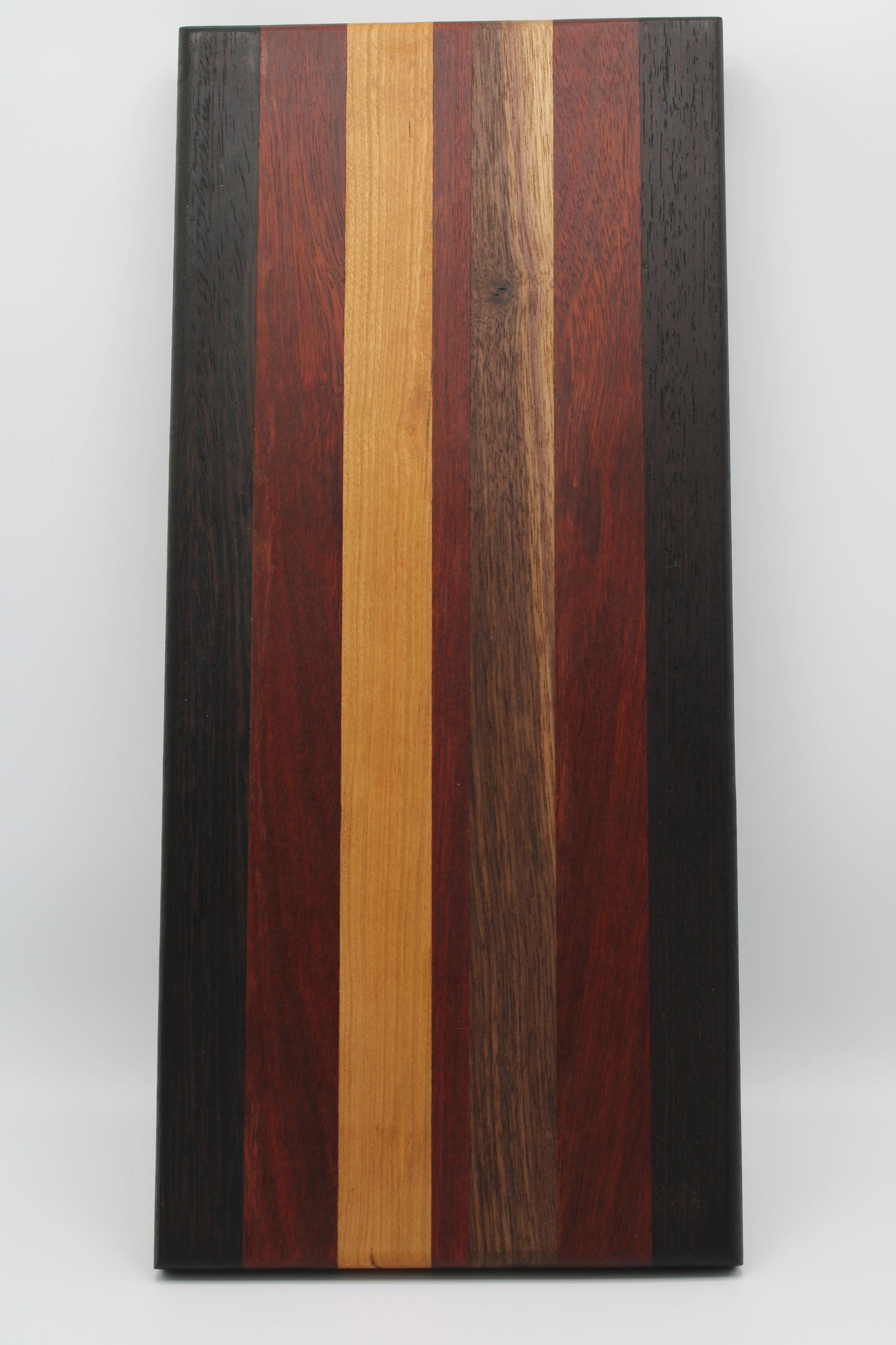 Design #011 wood used Cherry, Zebrawood, Bloodwood and Wenge 17.75x8x1