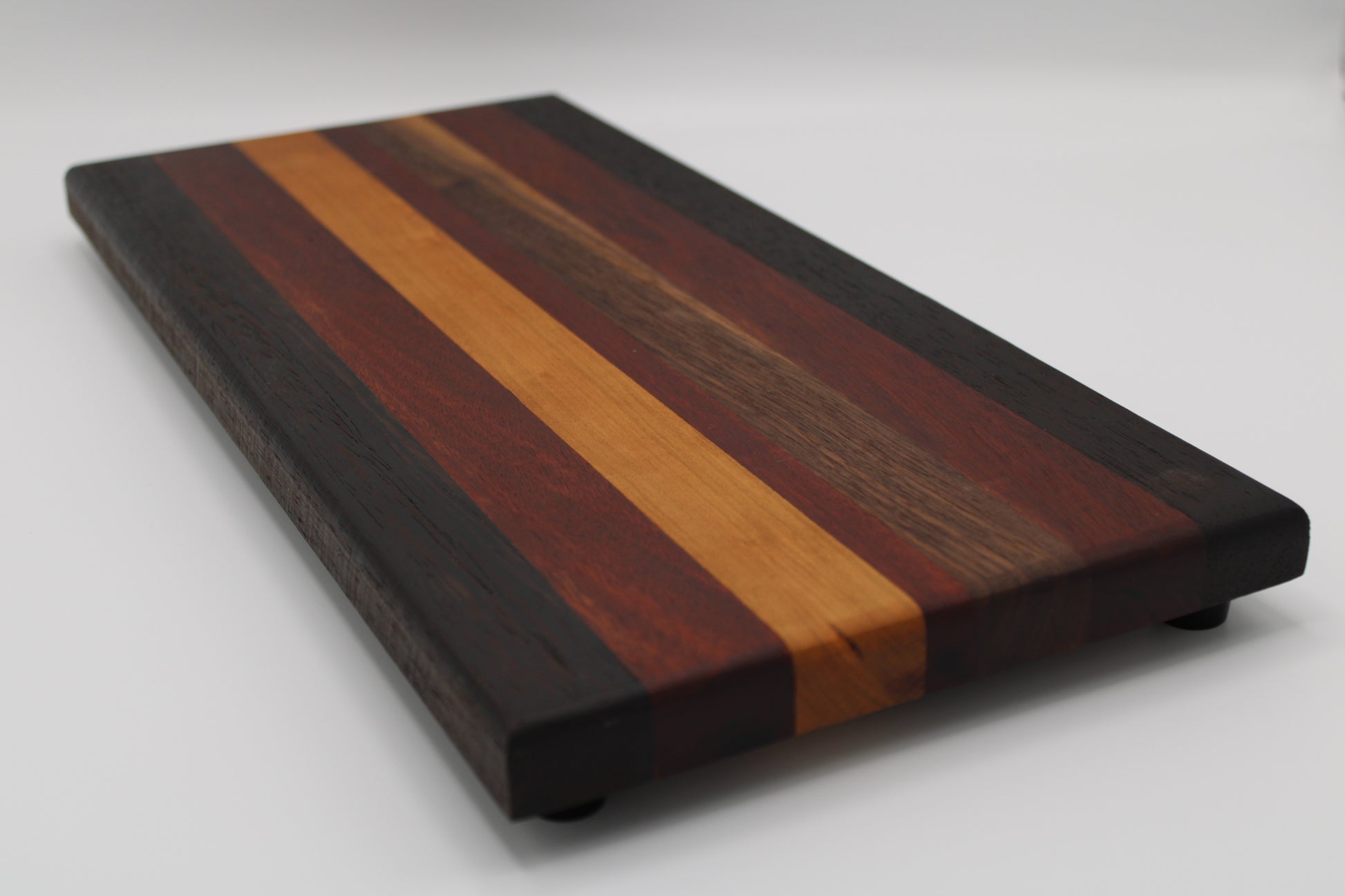 Design #011 wood used Cherry, Zebrawood, Bloodwood and Wenge 17.75x8x1