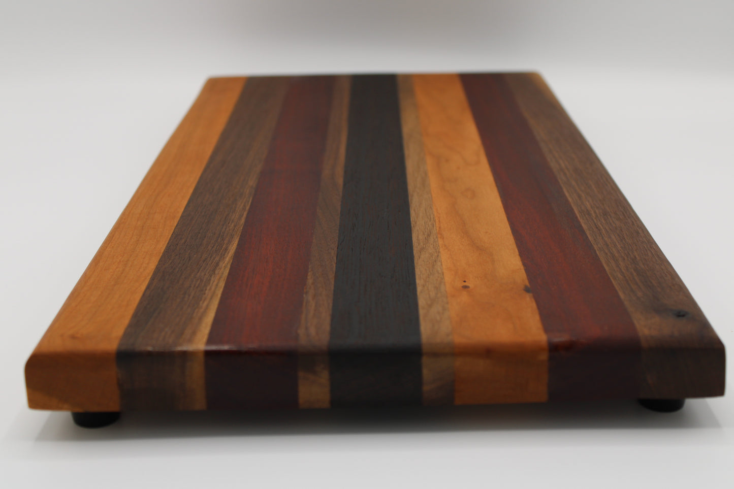 Design #010 wood used Cherry, Walnut, Bloodwood and Wenge 17.75x9.5x1