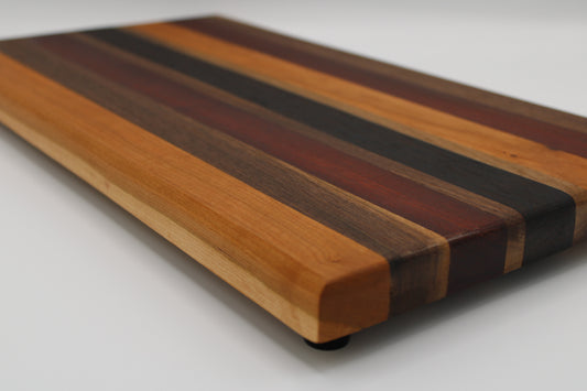 Design #010 wood used Cherry, Walnut, Bloodwood and Wenge 17.75x9.5x1