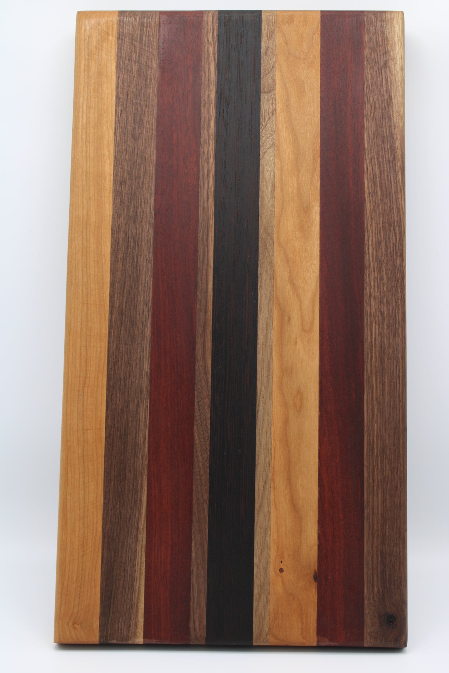 Design #010 wood used Cherry, Walnut, Bloodwood and Wenge 17.75x9.5x1