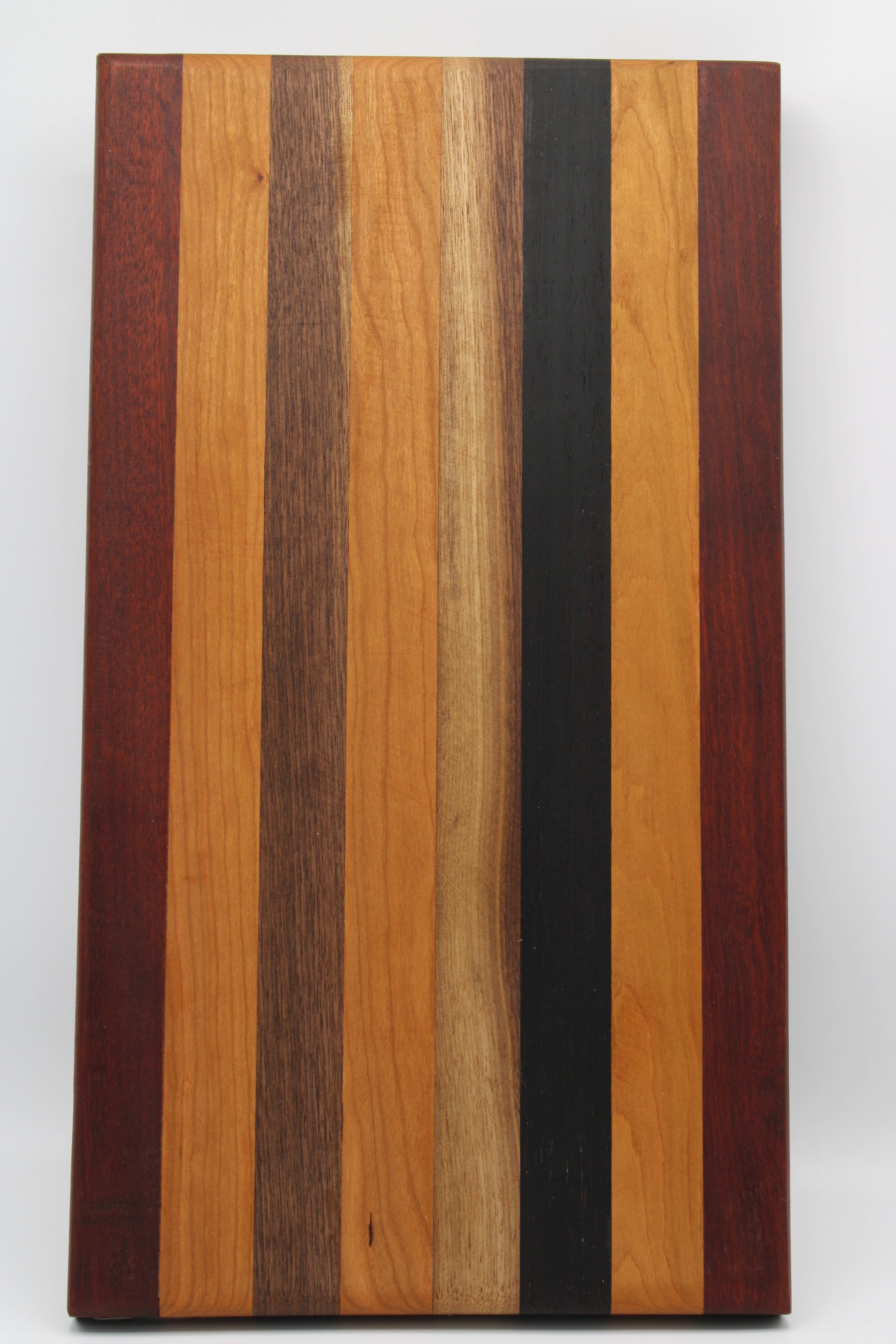 Design #002 wood used Cherry, Bloodwood, Wenge and Walnut 17.75x10.x1