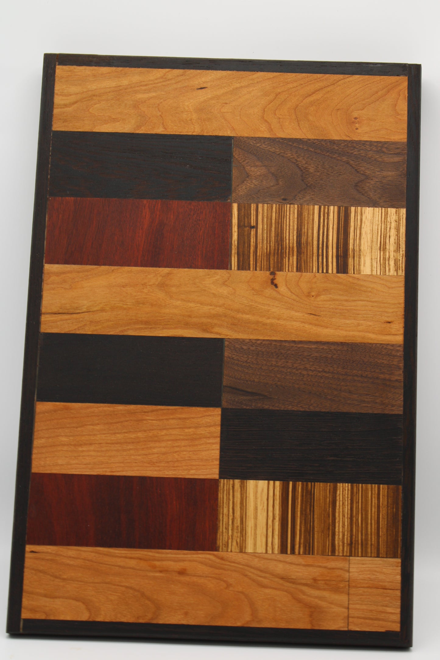 Design #001 wood used Cherry, Bloodwood, Wenge, Zebrawood and Walnut 17x11.5.x1