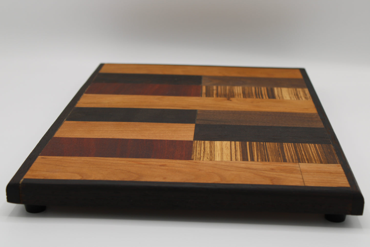 Design #001 wood used Cherry, Bloodwood, Wenge, Zebrawood and Walnut 17x11.5.x1