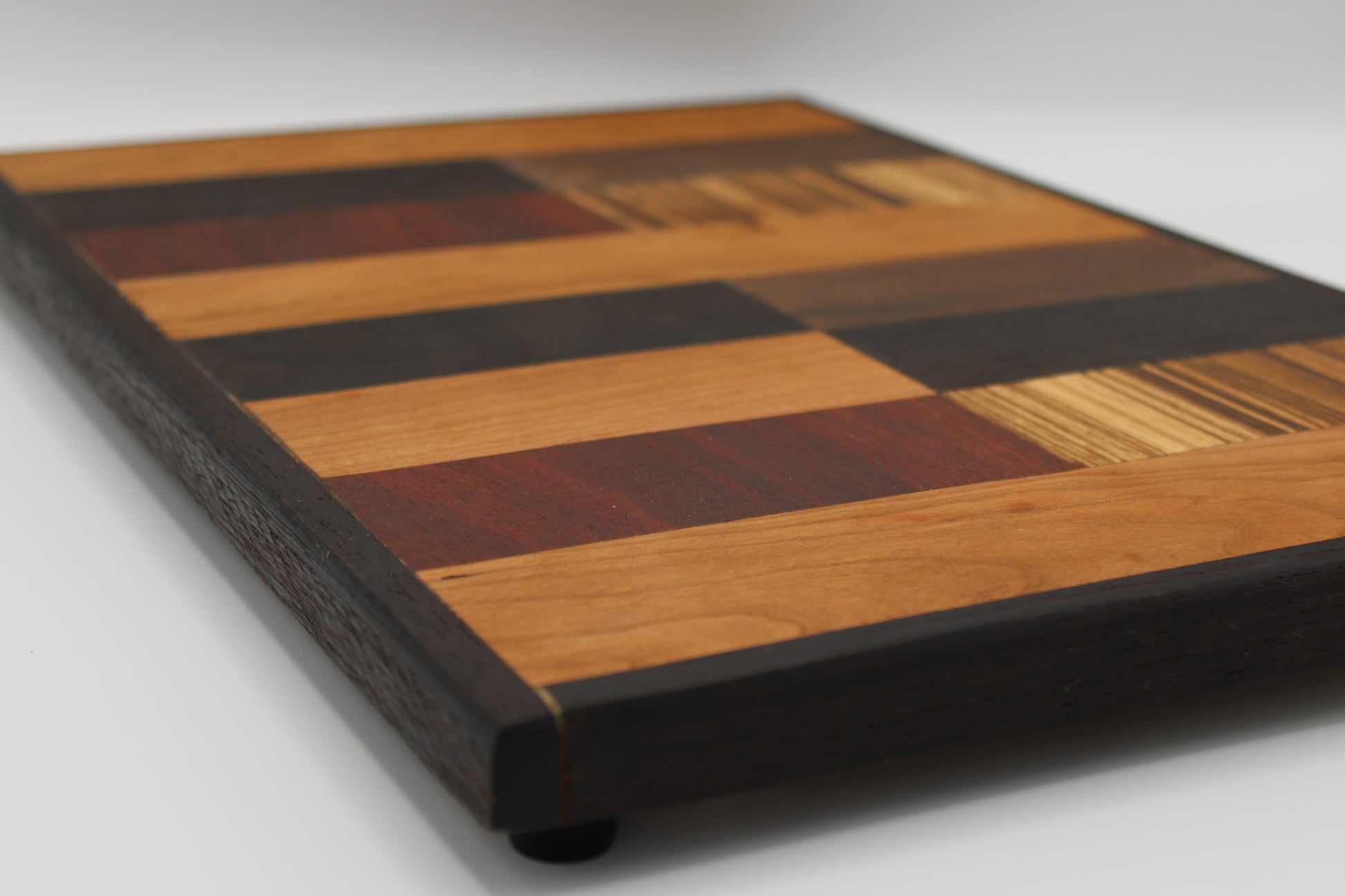 Design #001 wood used Cherry, Bloodwood, Wenge, Zebrawood and Walnut 17x11.5.x1