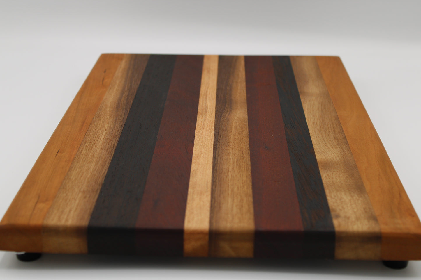 Design #003 wood used Cherry, Bloodwood, Wenge and Walnut 18x11.25.x1