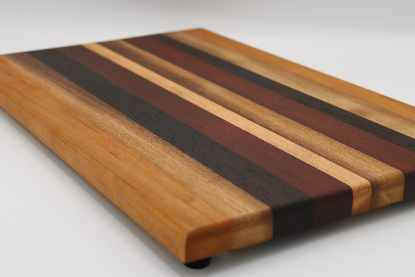 Design #003 wood used Cherry, Bloodwood, Wenge and Walnut 18x11.25.x1