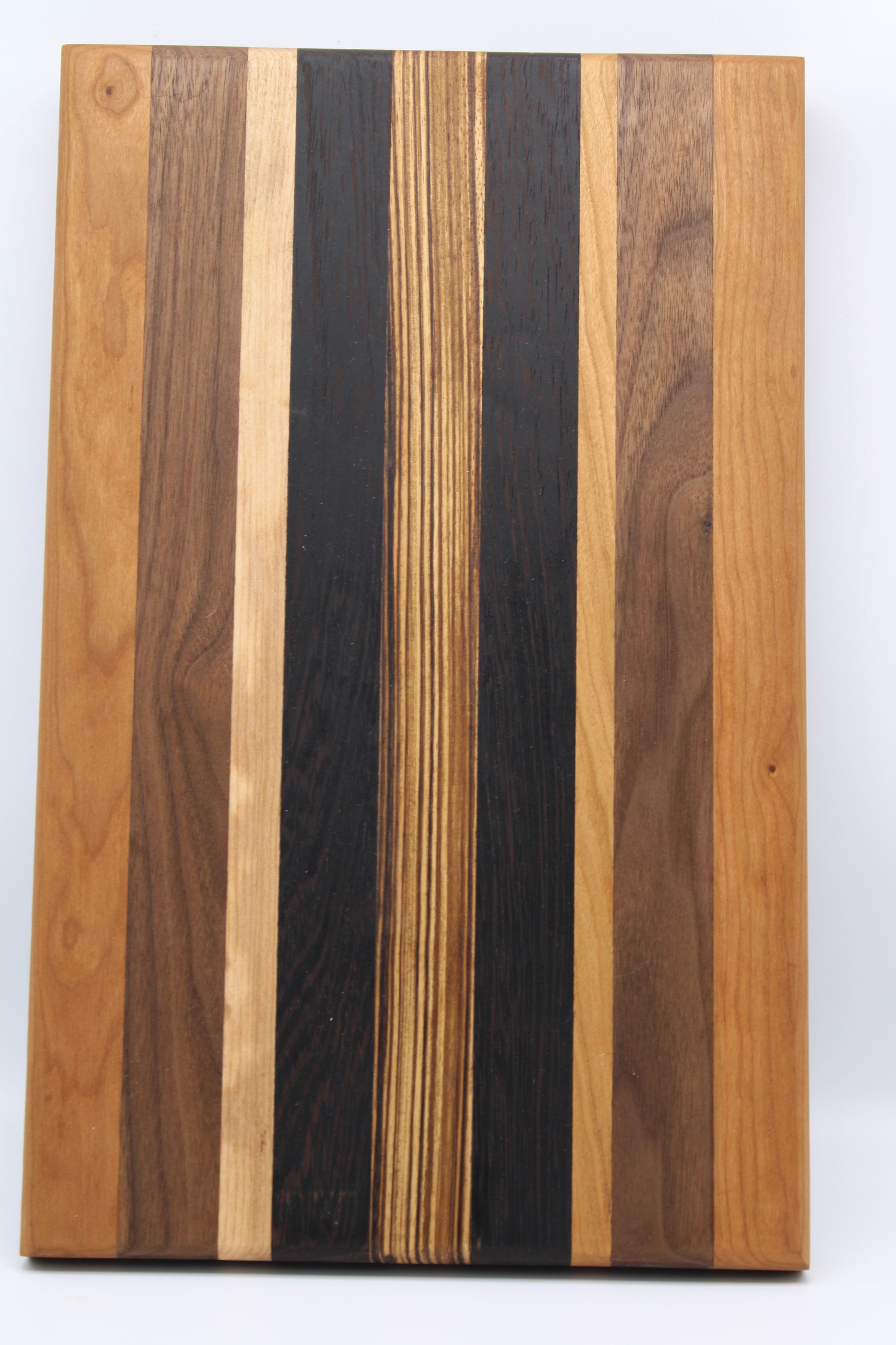 Design #008 wood used Cherry, Zebrawood, Wenge and Walnut 16x10x1