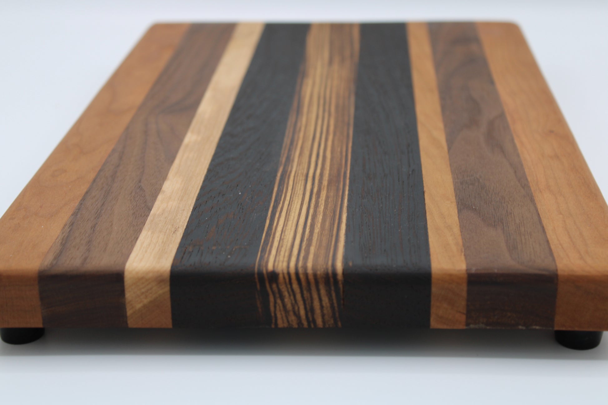 Design #008 wood used Cherry, Zebrawood, Wenge and Walnut 16x10x1