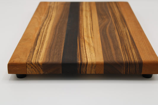 Design #009 wood used Cherry, Zebrawood, Wenge and Walnut 16x10x1
