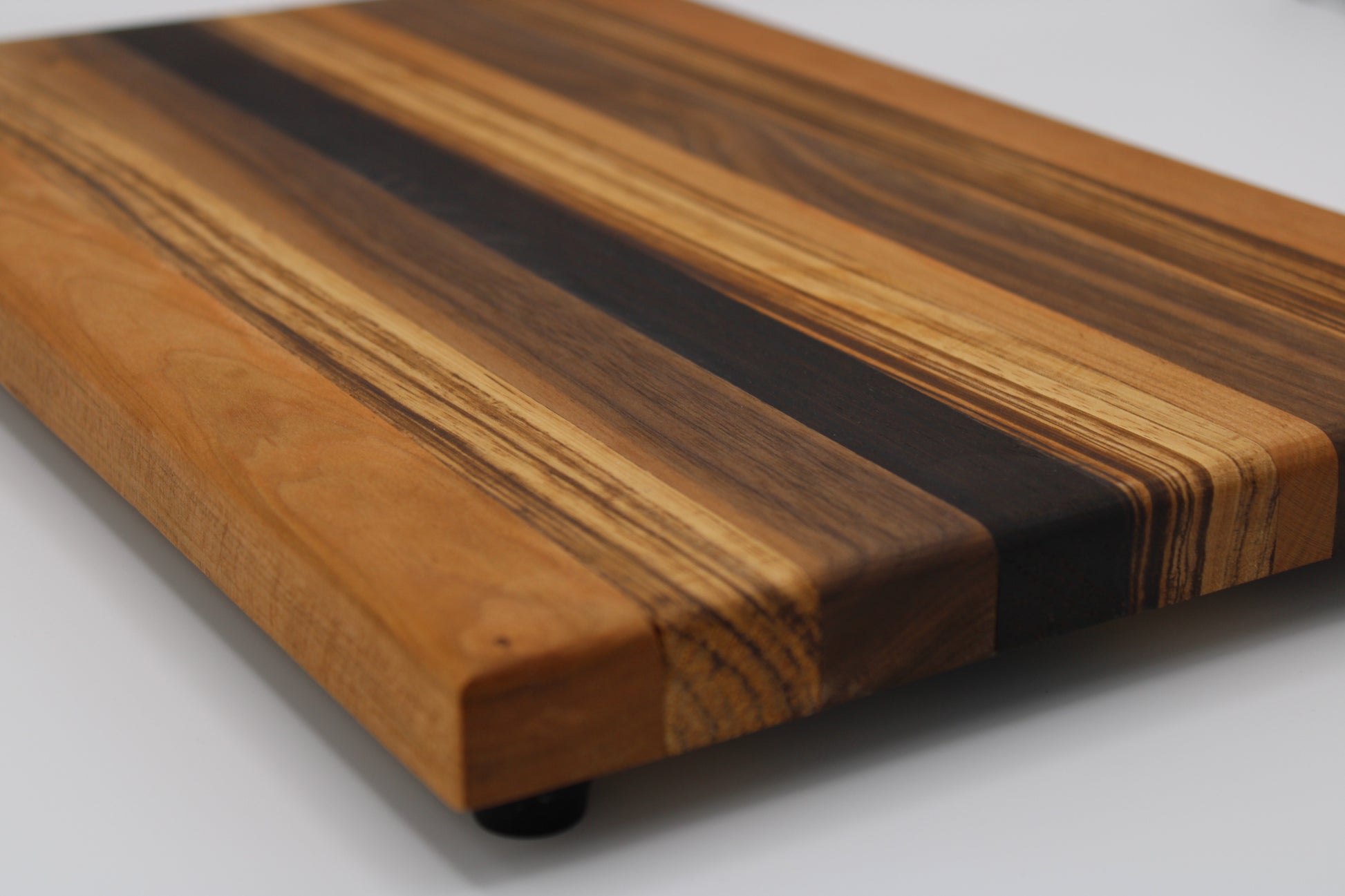 Design #009 wood used Cherry, Zebrawood, Wenge and Walnut 16x10x1