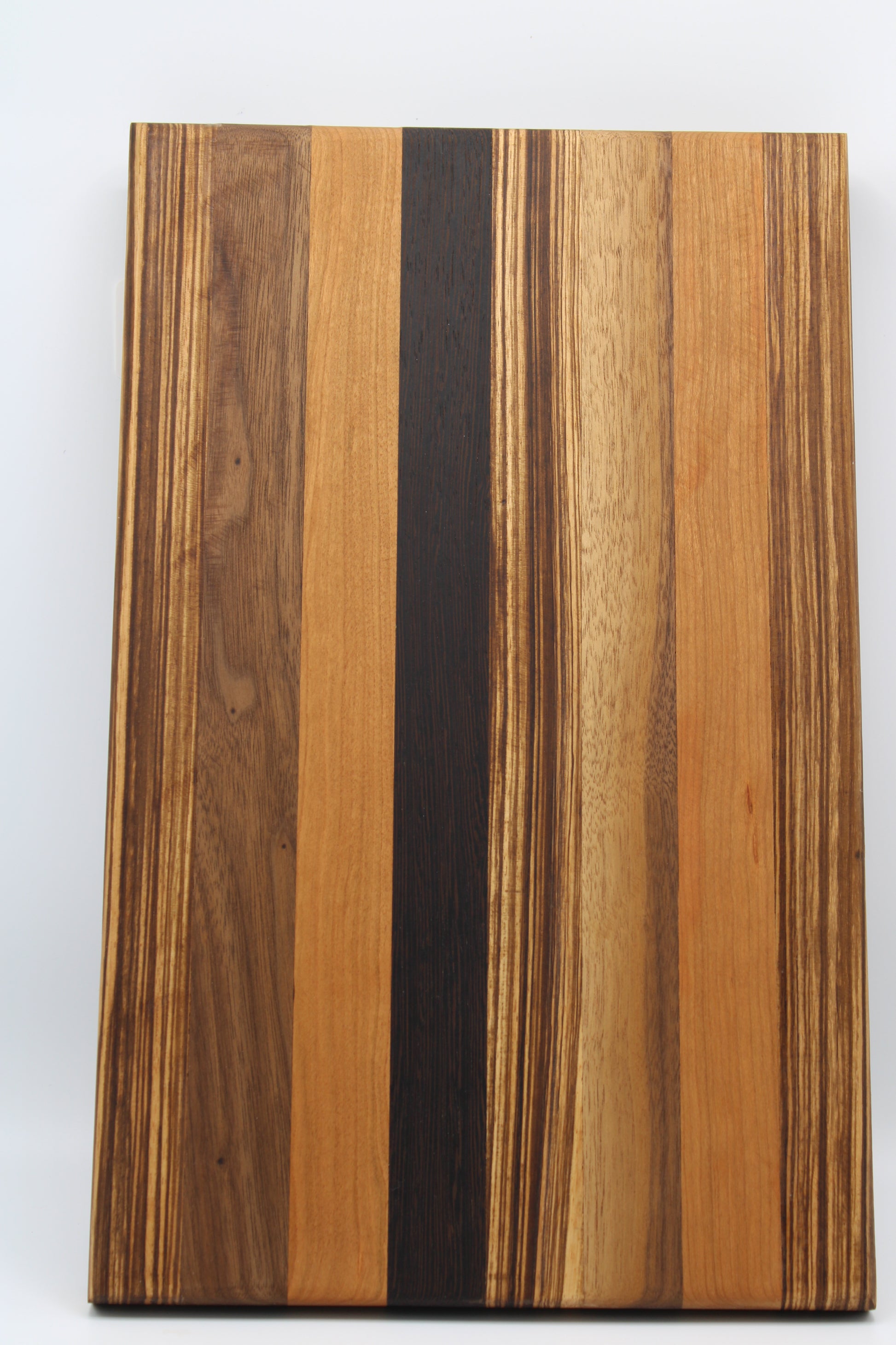 Design #007 wood used Cherry, Zebrawood, Wenge and Walnut 16x10x1