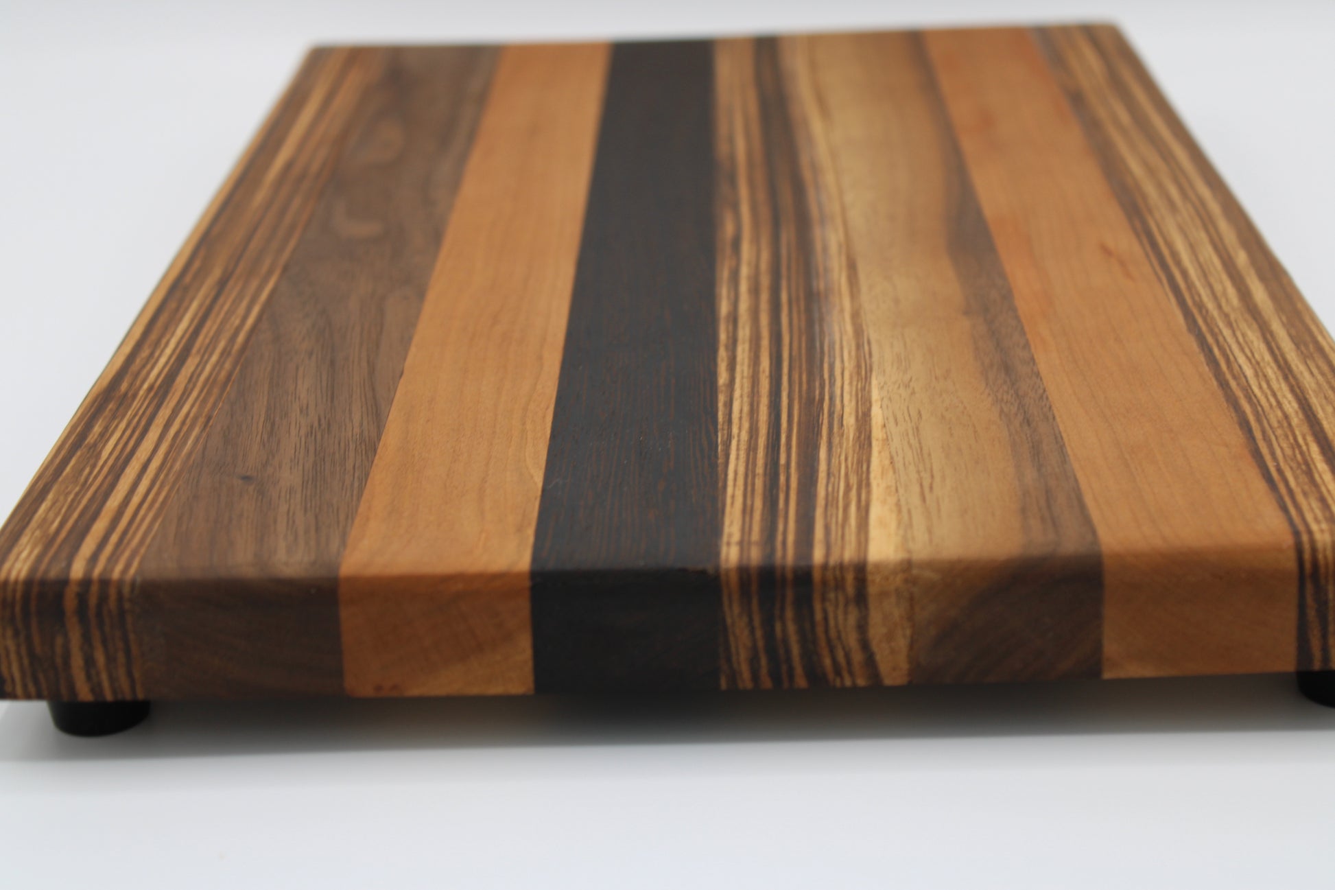 Design #007 wood used Cherry, Zebrawood, Wenge and Walnut 16x10x1