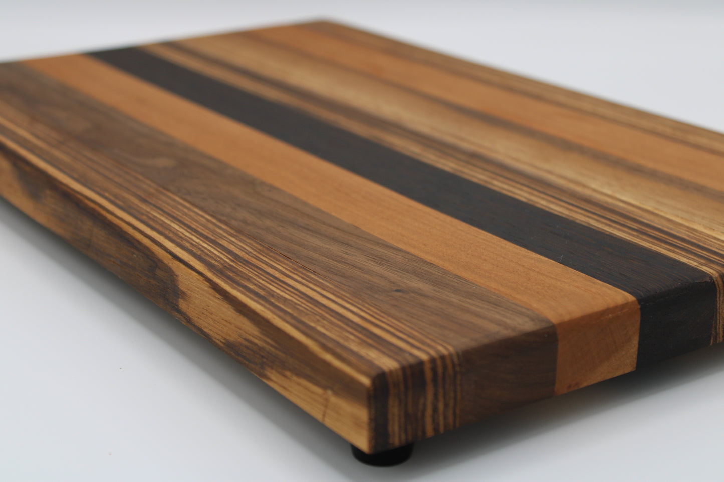 Design #007 wood used Cherry, Zebrawood, Wenge and Walnut 16x10x1