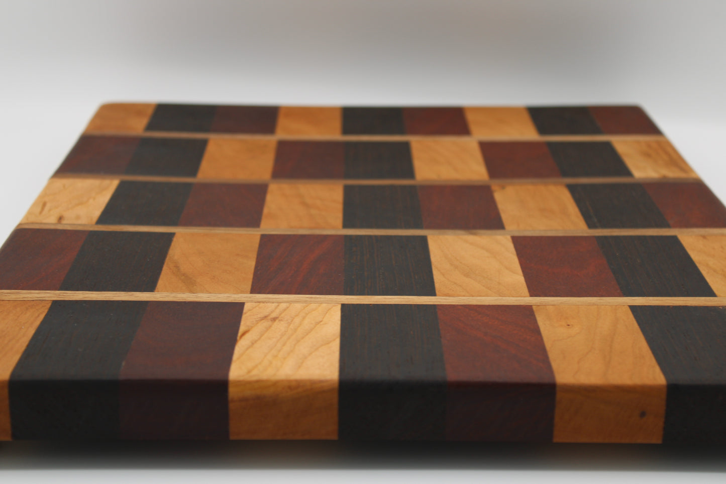 Design #006 wood used Cherry, Bloodwood, Wenge and Walnut 16.5x13.3x1