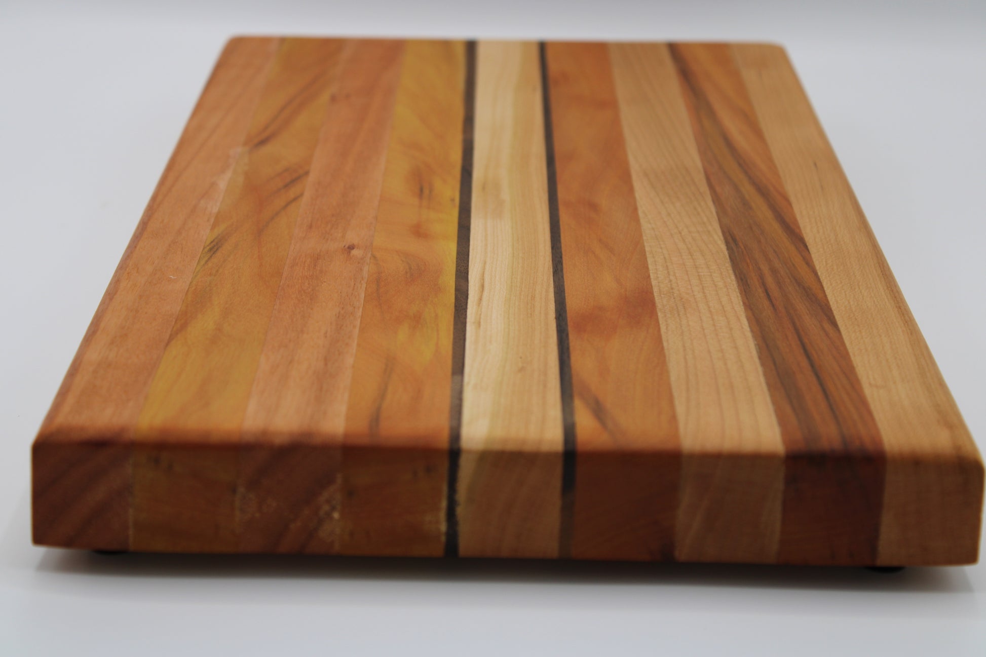 Design #035 wood used Yellowheart, Walnut, Red Grandis, Cherry 15.75x9x1.25