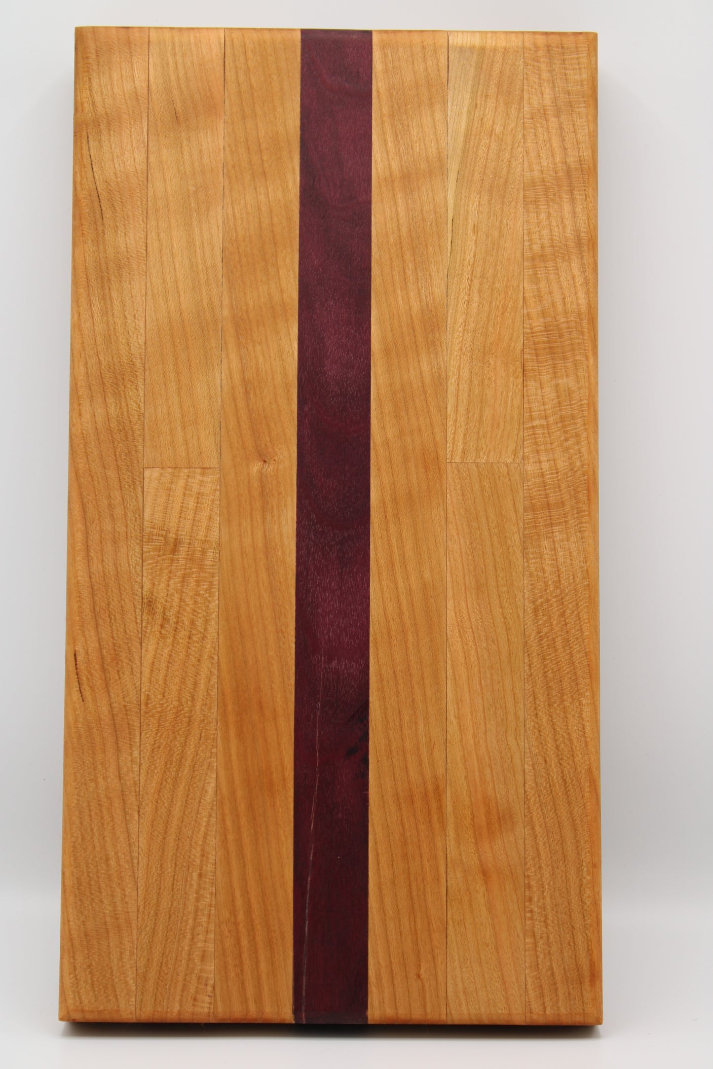 Design #038 wood used Cherry and Purpleheart 14x10x1