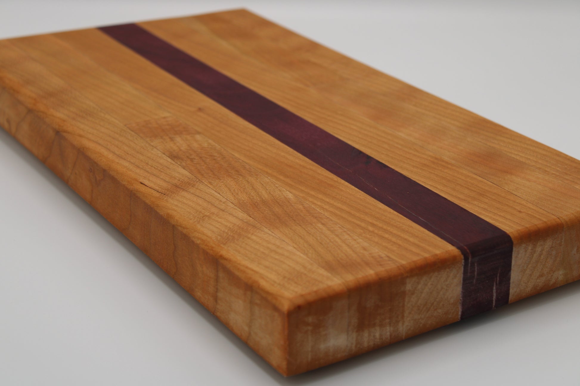 Design #038 wood used Cherry and Purpleheart 14x10x1