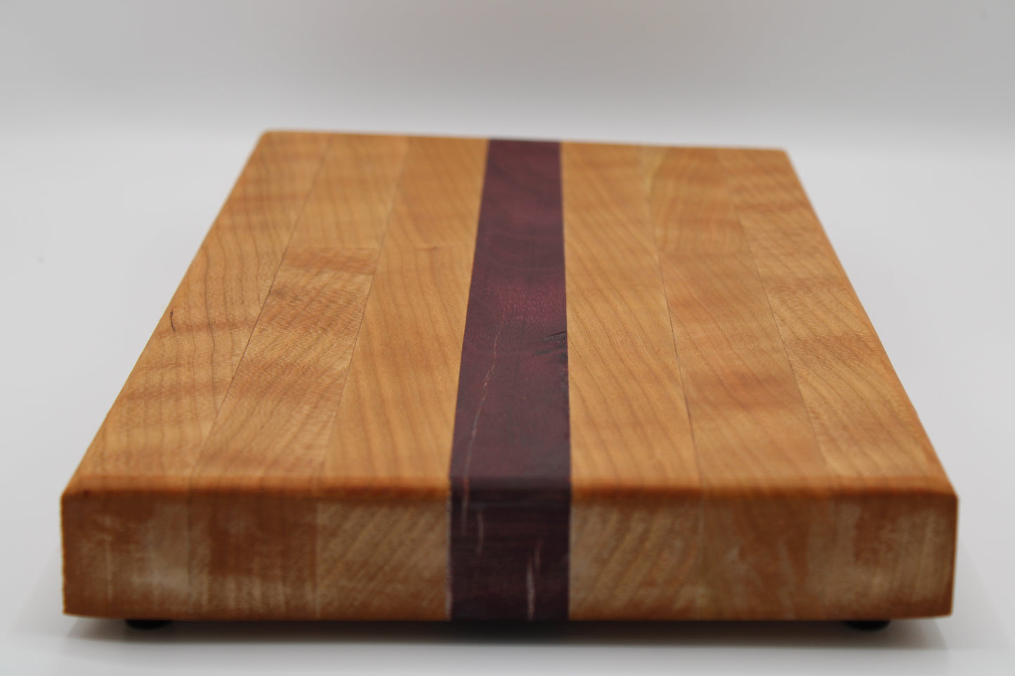 Design #038 wood used Cherry and Purpleheart 14x10x1