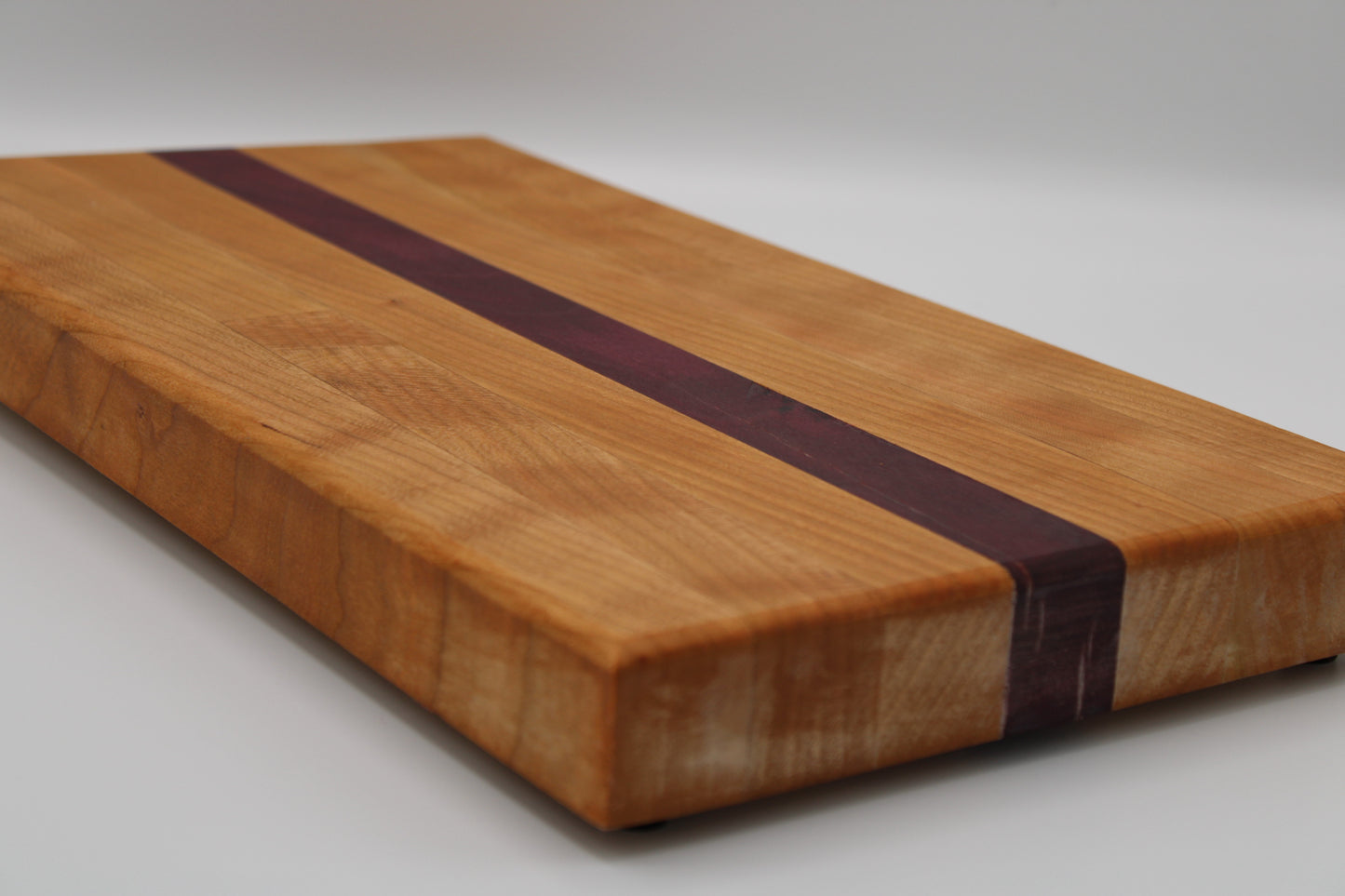 Design #038 wood used Cherry and Purpleheart 14x10x1