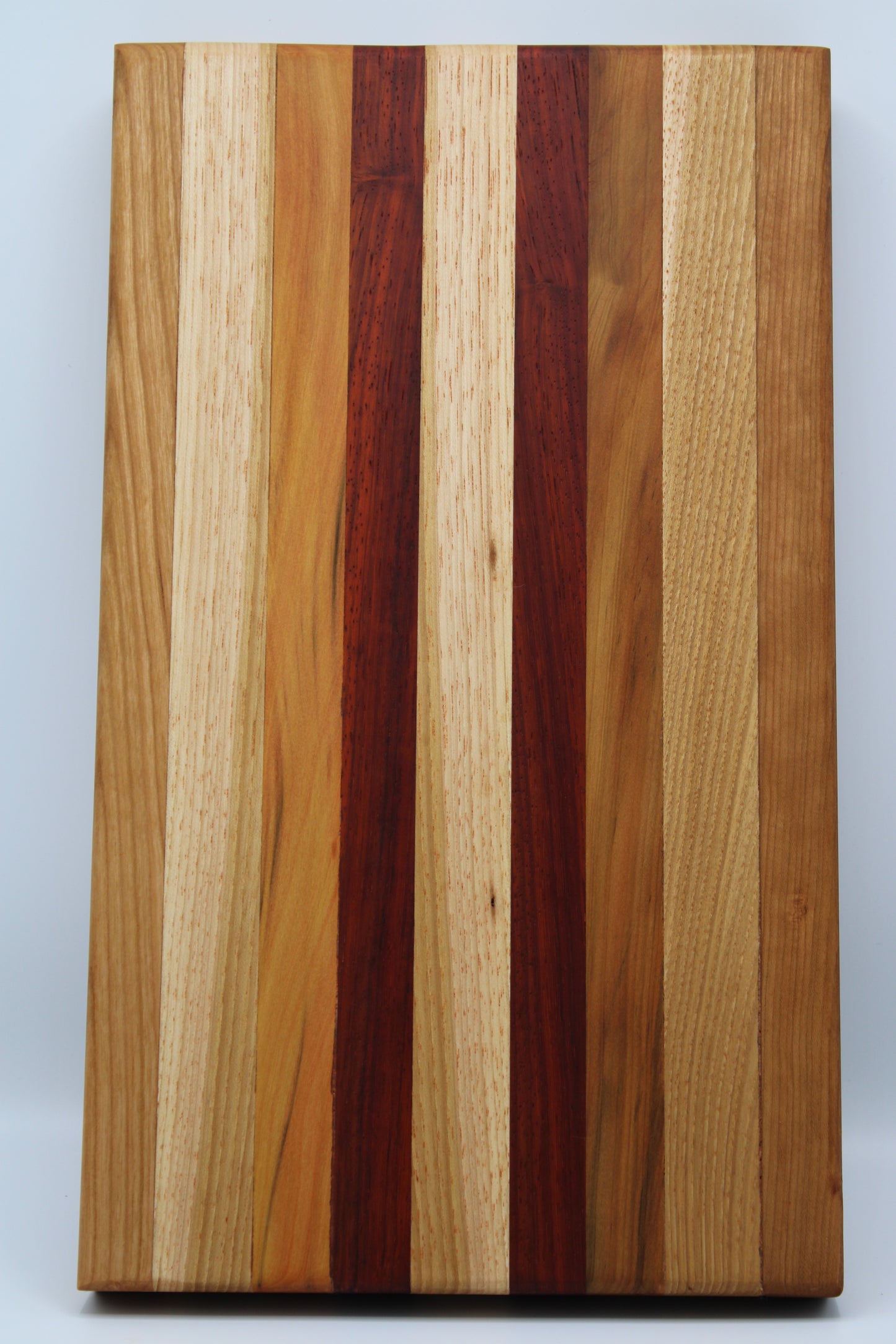 Design #040 wood used Cherry, Padauk, Yellowheart and Hickory 16x19x1.25