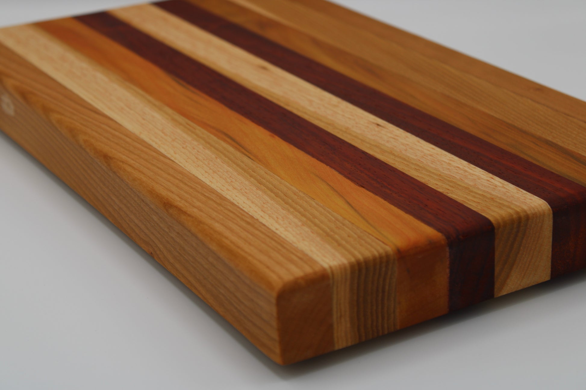 Design #040 wood used Cherry, Padauk, Yellowheart and Hickory 16x19x1.25